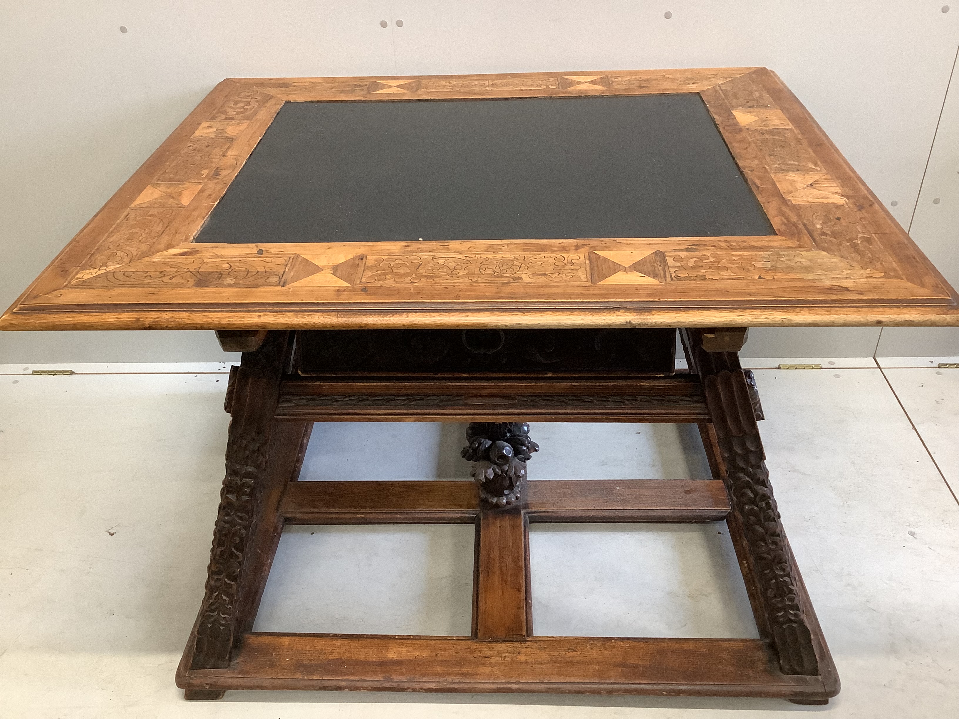 An Italian marquetry inlaid rectangular walnut slate top centre table, width 123cm, depth 104cm, height 79cm